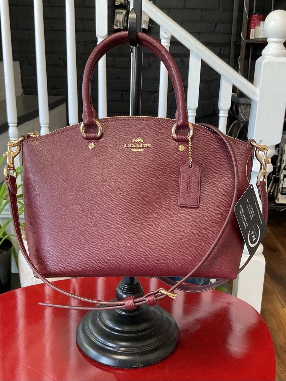 Coach in Burgundy with Gold Hardware